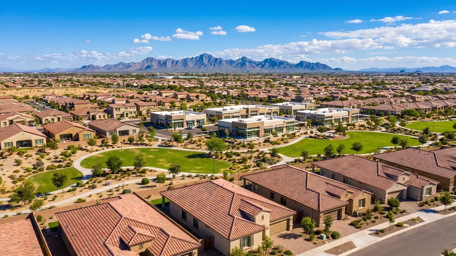 Bright daylight view of a business district in Goodyear, Arizona, where BrandFamous serves local companies.